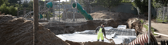 installation of a sewage plastic pipe during the construction of a house. Creative Banner. Copyspace image