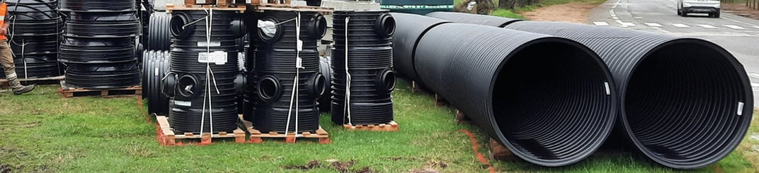 installation of a sewage plastic pipe during the construction of a house. Creative Banner. Copyspace image