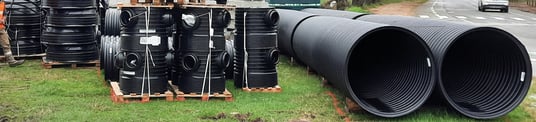 installation of a sewage plastic pipe during the construction of a house. Creative Banner. Copyspace image