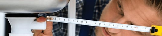 installation of a sewage plastic pipe during the construction of a house. Creative Banner. Copyspace image