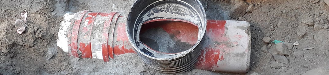 installation of a sewage plastic pipe during the construction of a house. Creative Banner. Copyspace image