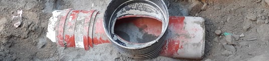 installation of a sewage plastic pipe during the construction of a house. Creative Banner. Copyspace image
