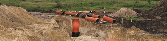 installation of a sewage plastic pipe during the construction of a house. Creative Banner. Copyspace image