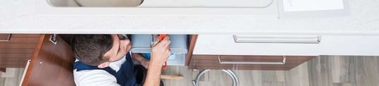 installation of a sewage plastic pipe during the construction of a house. Creative Banner. Copyspace image