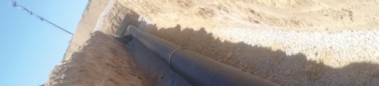 installation of a sewage plastic pipe during the construction of a house. Creative Banner. Copyspace image