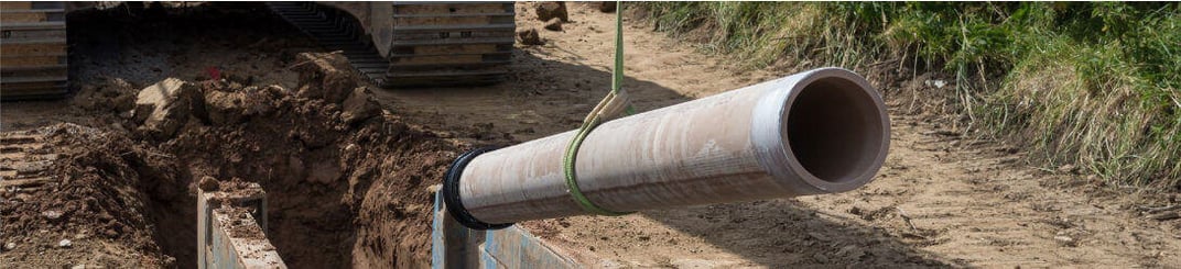 installation of a sewage plastic pipe during the construction of a house. Creative Banner. Copyspace image