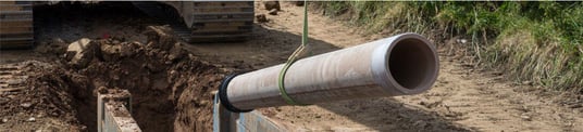 installation of a sewage plastic pipe during the construction of a house. Creative Banner. Copyspace image