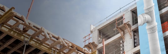 installation of a sewage plastic pipe during the construction of a house. Creative Banner. Copyspace image