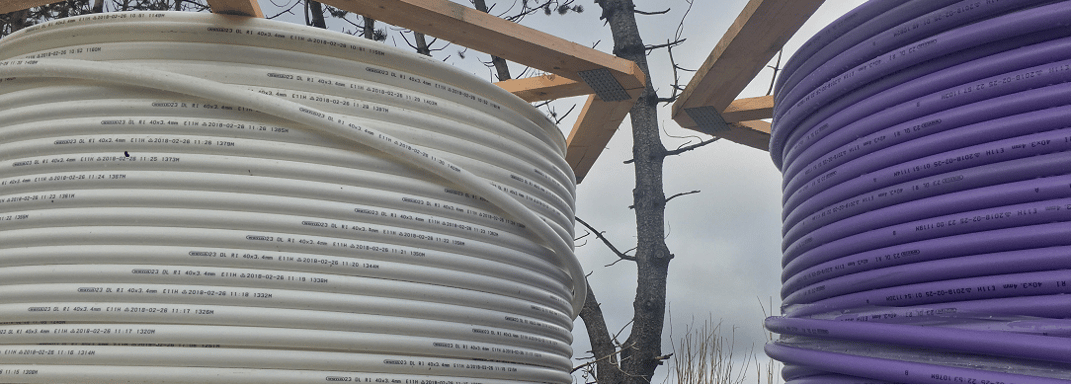 installation of a sewage plastic pipe during the construction of a house. Creative Banner. Copyspace image