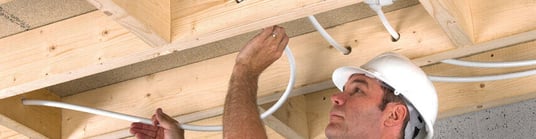 installation of a sewage plastic pipe during the construction of a house. Creative Banner. Copyspace image
