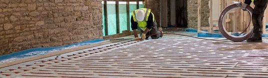 installation of a sewage plastic pipe during the construction of a house. Creative Banner. Copyspace image