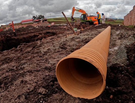 installation of a sewage plastic pipe during the construction of a house. Creative Banner. Copyspace image