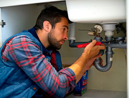 installation of a sewage plastic pipe during the construction of a house. Creative Banner. Copyspace image
