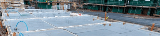 installation of a sewage plastic pipe during the construction of a house. Creative Banner. Copyspace image