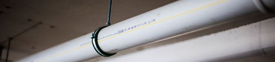 installation of a sewage plastic pipe during the construction of a house. Creative Banner. Copyspace image