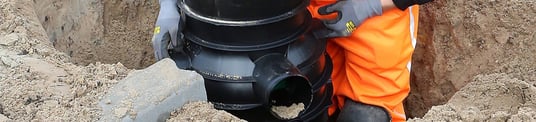installation of a sewage plastic pipe during the construction of a house. Creative Banner. Copyspace image
