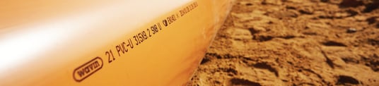 installation of a sewage plastic pipe during the construction of a house. Creative Banner. Copyspace image