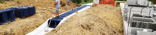 installation of a sewage plastic pipe during the construction of a house. Creative Banner. Copyspace image